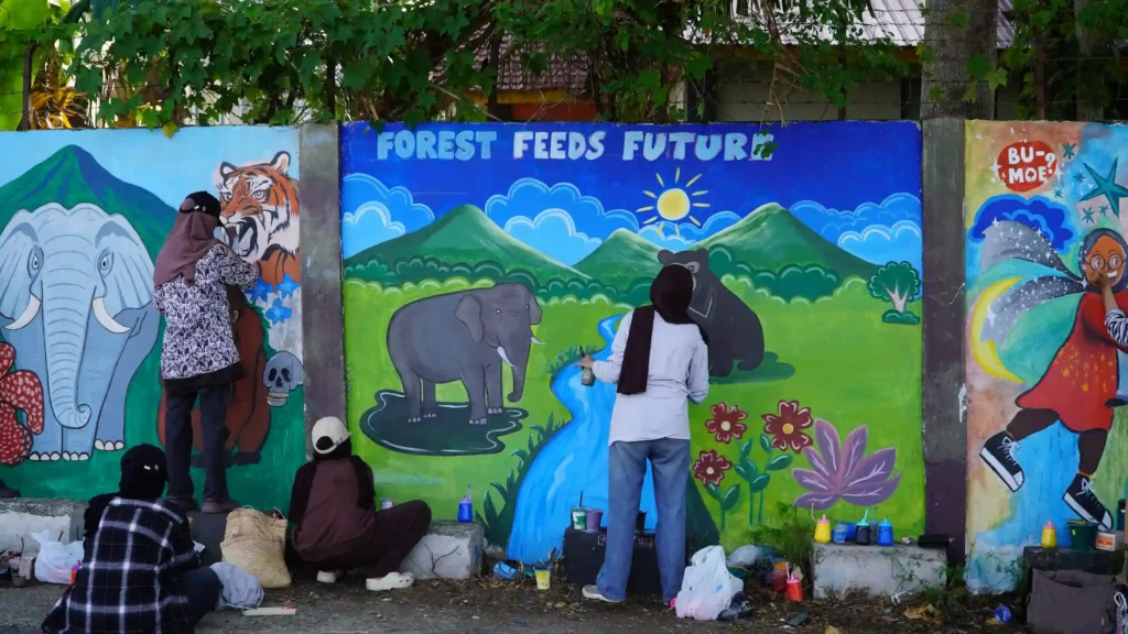 Participants are creating a live mural.